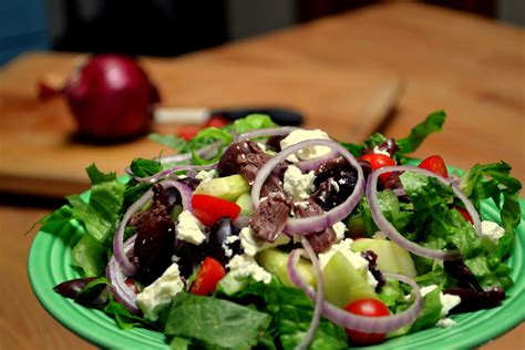 Greek Salad, featuring Crisp Romaine Lettuce with Cucumbers, Tomatoes ...