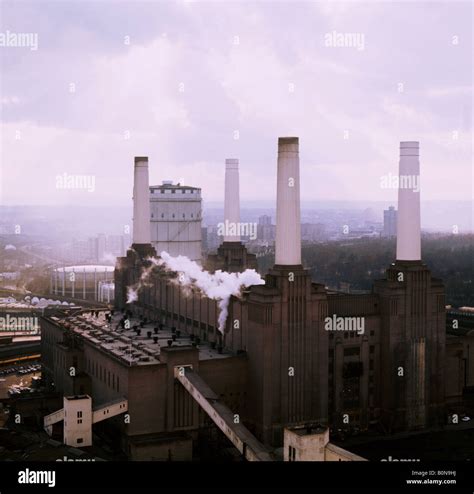 aerial photograph of the smoking chimneys of Battersea Power Station ...