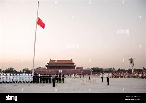 Beijing Flag Lowering Ceremony during sunset at Tiananmen Square China ...