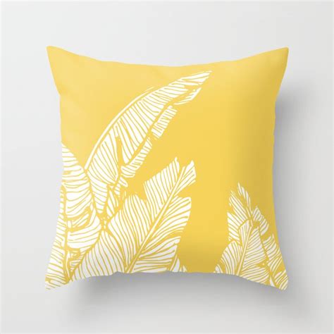 Banana Leaves on Yellow Throw Pillow by DesigndN | Society6