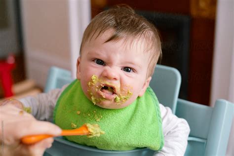 "Baby Eating Avocado From A Plastic Soon." by Stocksy Contributor "Lucas Saugen Photography LLC ...