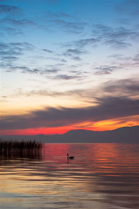 A new colourful lakeside sunset: Stillness in Colour - NiO Photography