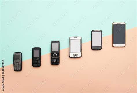 evolution of cell phones. Technology development telephone and pda concept. Vintage and new ...