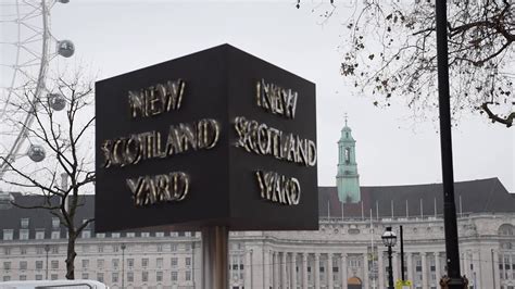 New Scotland Yard sign official switch on - YouTube