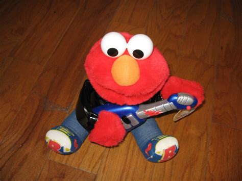 Sesame Street 1998 Rock and Roll Elmo plays guitar music vibrates