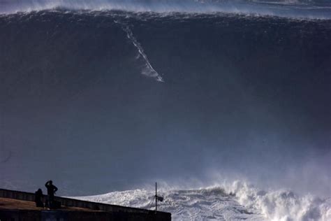 Praia do Norte, Portugal - Photos - Daredevil surfers ride giant waves ...