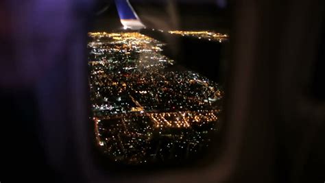 Airplane Window Seat - View Of Los Angeles At Night And Wing Of Plane ...