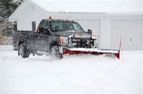 Truck plowing snow Stock Photo by ©inyrdreams 30767341