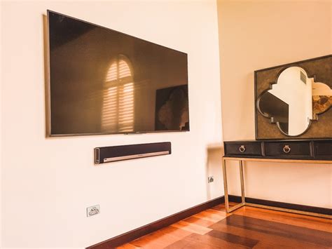 75 inch TV mounted with a Soundbar - Install Express