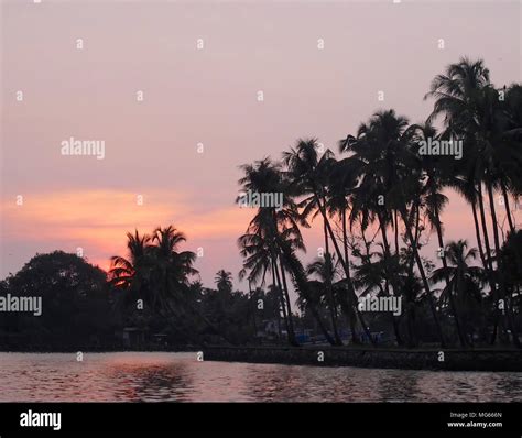 Sunset in the backwaters of Kerala Stock Photo - Alamy