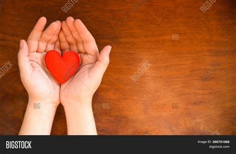 Hands Holding Heart Image & Photo (Free Trial) | Bigstock