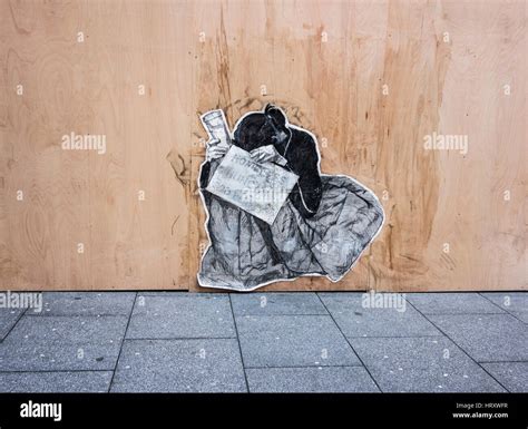 Artwork on a hoarding.Depicting homelessness Stock Photo - Alamy