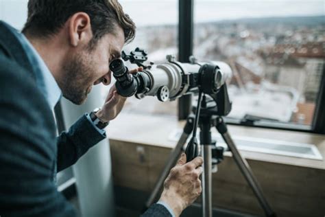 People Looking Through Telescope Stock Photos, Pictures & Royalty-Free Images - iStock