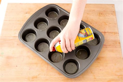 Coat a muffin tin with nonstick spray. - B+C Guides