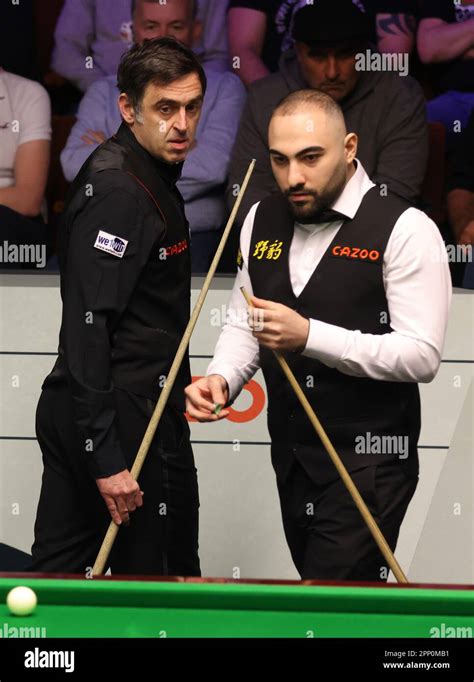 Ronnie O’Sullivan (left) and Hossein Vafaei during their match on day ...