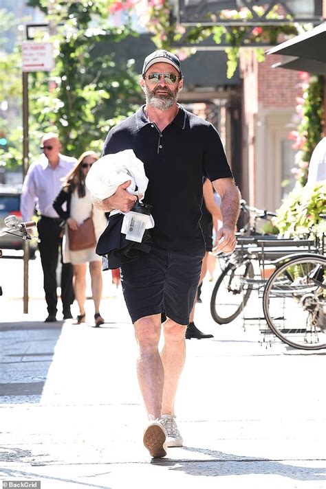 Hugh Jackman steps out WITHOUT his wedding ring in New York City after shock split from wife ...