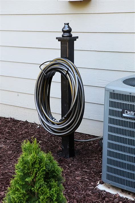 Decorative Hose Holder | Garden hose storage, Garden hose holder, Diy outdoor