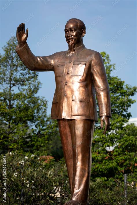 Recently polished bronze statue of Ho Chi Minh standing in the famous walking street in Ho Chi ...