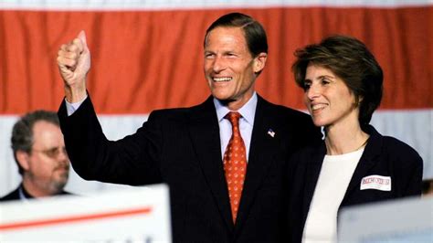 Attorney General Richard Blumenthal, left, holds hands with his wife ...