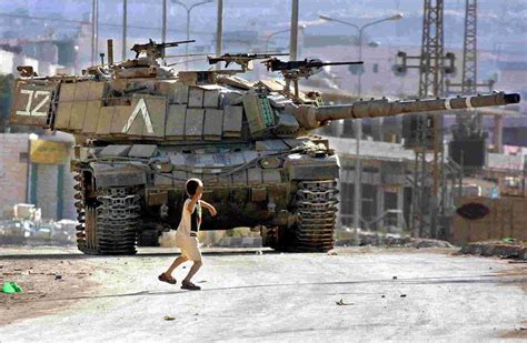 Palestine Rebellion, child throwing stone at tank. : r/pics