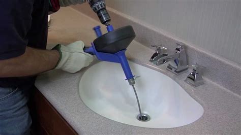 How To Use A Drain Snake: Video Tutorial | EarlyExperts