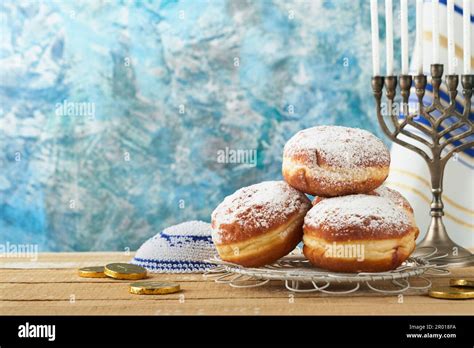 Happy Hanukkah. Hanukkah old Menorah against background of the Israeli ...