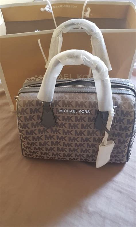 Michael kors duffle bag, Women's Fashion, Bags & Wallets, Cross-body ...