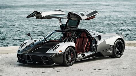 Download Pagani Huayra Gullwing Doors Wallpaper | Wallpapers.com