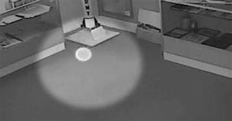 Mystery flying 'spirit orb' caught on camera TWICE at space museum ...