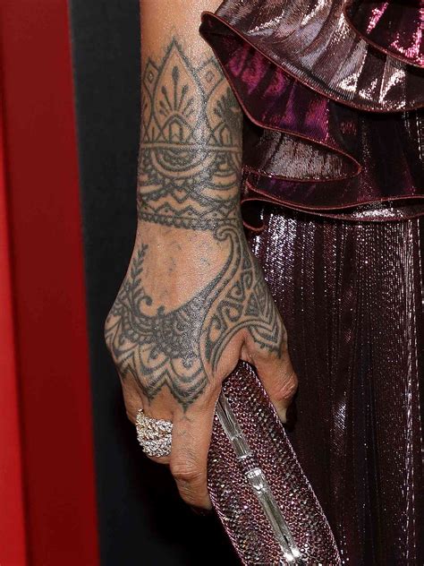 A Guide to Rihanna's Tattoos and What They Mean