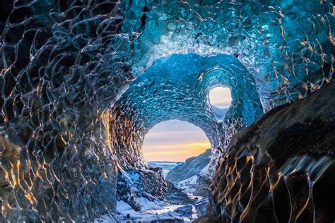 Vatnajokull National Park in Jokulsarlon Iceland. An ice cave in a glacier reflecting the ...