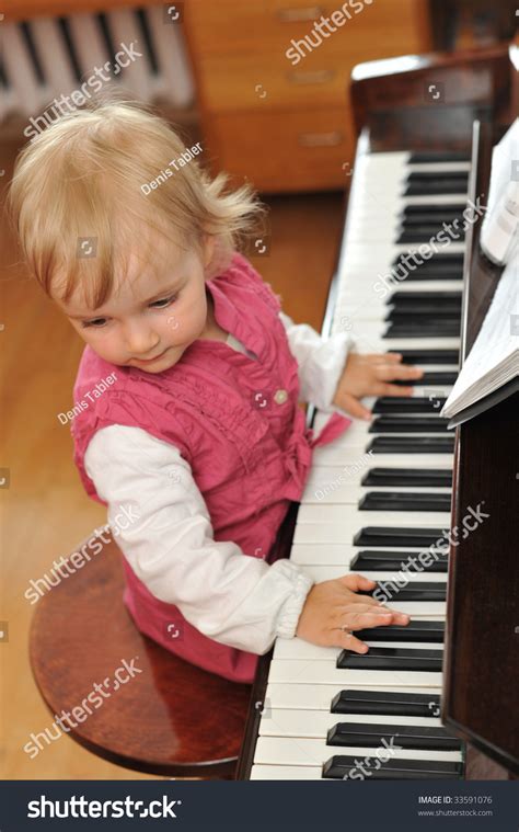 Beautiful Little Girl Plays Piano Stock Photo 33591076 | Shutterstock