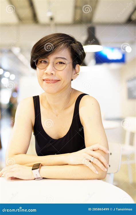Stylish, Happy and Confident Short Hairstyle Asian Woman Wear Eyeglasses, Smiling, Sitting ...