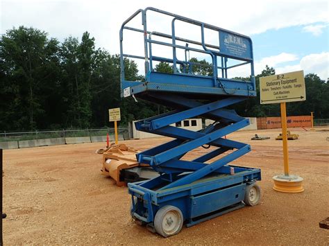 JLG MODEL 2033E ELECTRIC SCISSOR LIFT W/ WHEELS (B-2) - J.M. Wood ...