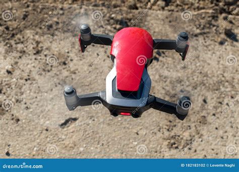 Small Sized Red Drone with High Resolution Camera Hovering in Air for Aerial Photography Stock ...