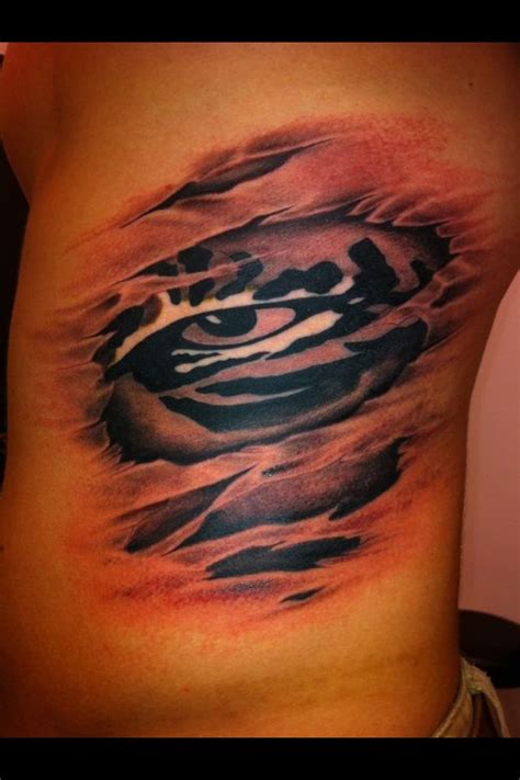 First Tattoo ever. LSU eye of the tiger with a twist. Tiger Tattoo Meaning, Tiger Eyes Tattoo ...