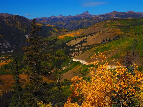 Red Mountain, Colorado stands guard on the horizon at a commanding 12,826 feet of elevation ...