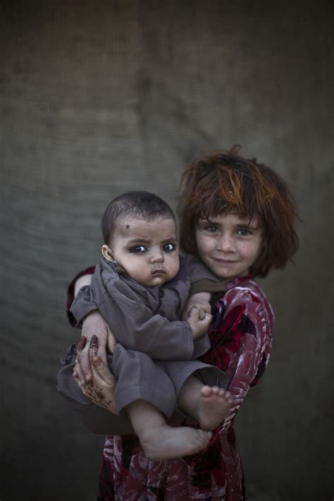 Faces of young Afghan refugees