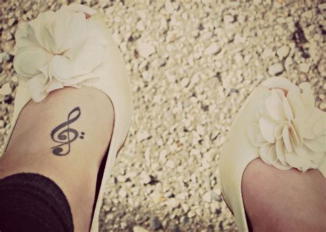 Treble & Bass Clef Foot Tattoo | Tattoos, Foot tattoos, Foot tattoo