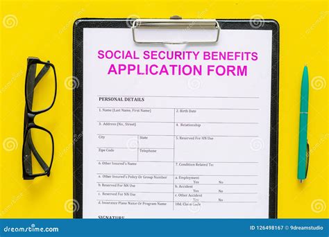 Social Security Benefits. Application Form Near Pen and Glasses on ...