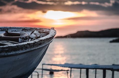 Old Fishing Boat on Sunset, Paint is Coming Out Stock Photo - Image of ...