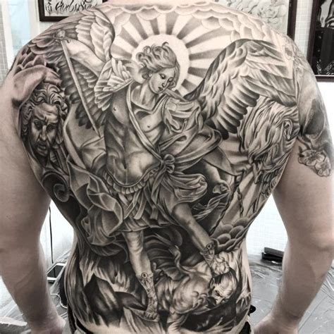 Saint Michael Tattoo_ | St michael tattoo, Archangel tattoo, Back tattoos for guys