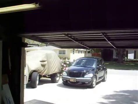 Automatic opening one piece garage door | Garage doors, Swing gate ...