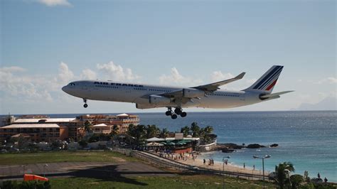 Air France Airbus A340-313 Landing at Princess Juliana Airport - backiee