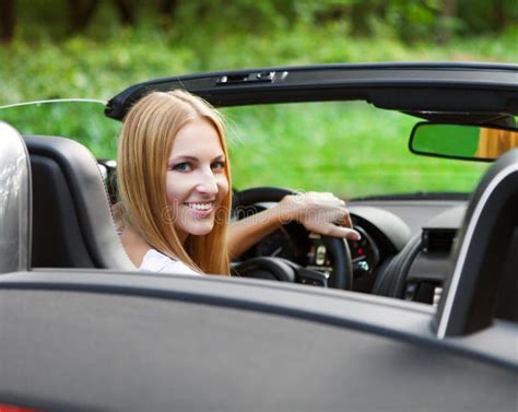 Blond Young Woman Driving a Sports Car Stock Photo - Image of summer, automobile: 33886986