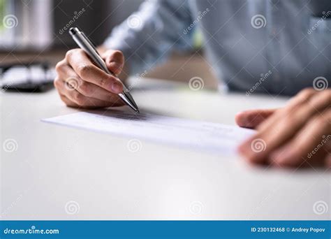 Writing and Signing Check Document Stock Photo - Image of cheques ...