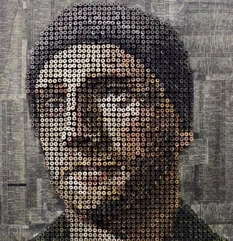 a portrait made up of many different colored circles and squares with the image of a man's face