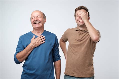 Dad jokes: Father, son laughing after telling a joke - Study Finds