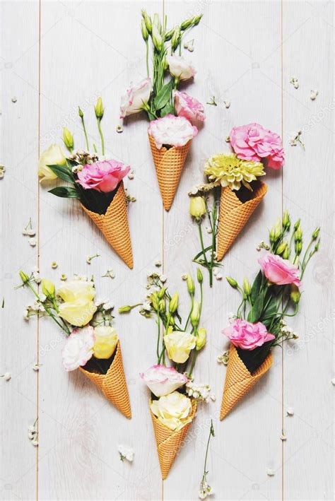 Bright Flowers Ice Cream Cones — Stock Photo © TijanaM #176242086