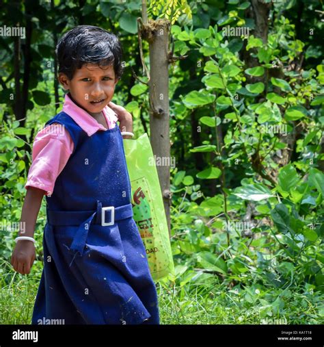 Angul, odisha, India - SEPTEMBER 1, 2017: A village young girl walking ...